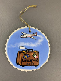 Airplane and suitcase ornament