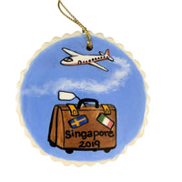 Airplane and suitcase ornament