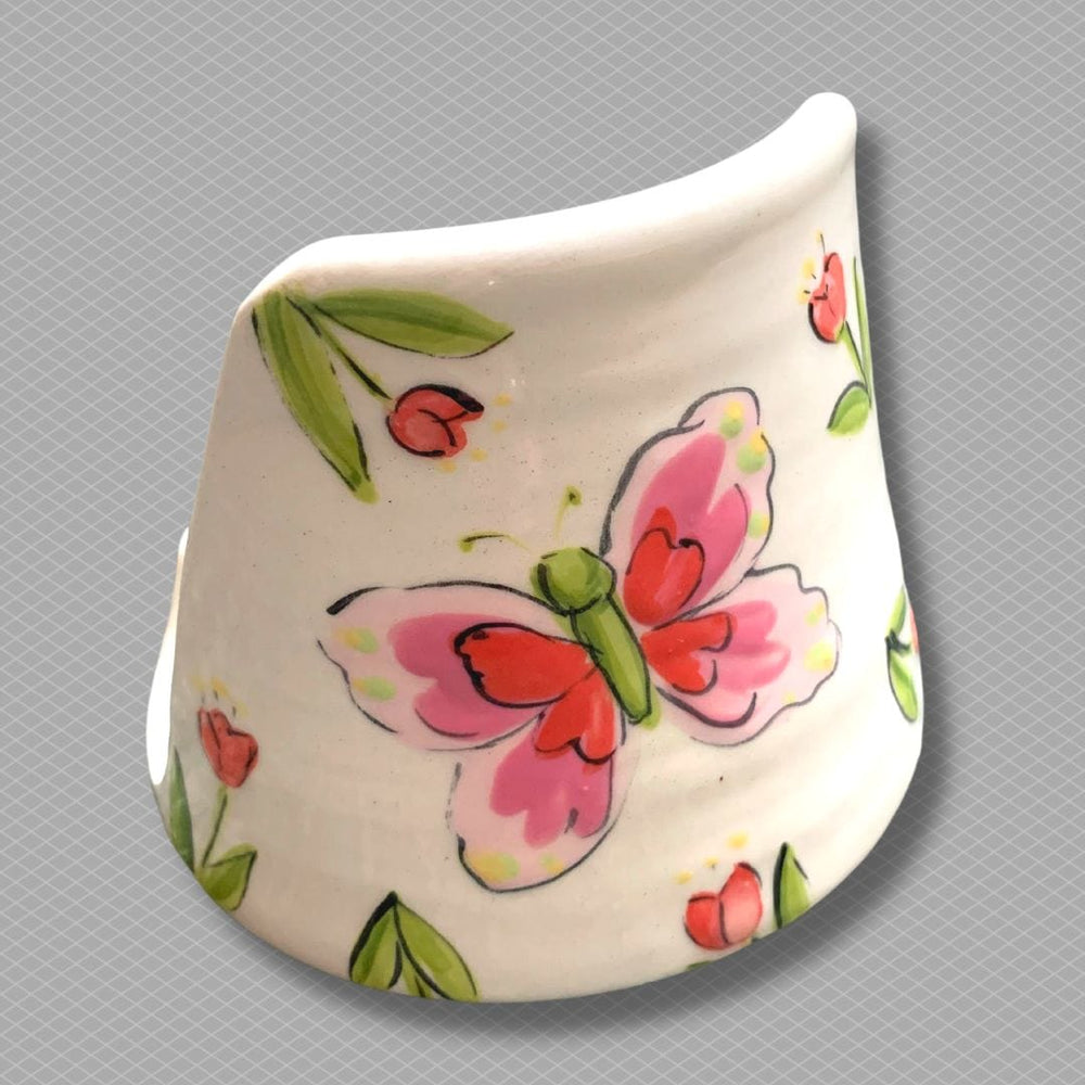 https://heatherlanepottery.com/cdn/shop/products/ButterflyPhoneholder1_500x@2x.jpg?v=1674569357